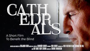 Cathedrals poster. A man with eyes closed appears in profile at the right of the image. Superimposed, in gothic lettering, is the word Cathedrals, followed in plainer text by the words A Short Film to Benefit the Blind. Film credits appear at the bottom of the poster.