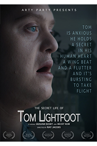 Film Poster for The Secret Life of Tom Lightfoot: close up of a man in profile who seems to be about to speak. Superimposed on top of the image are film credits and five award laurels.
